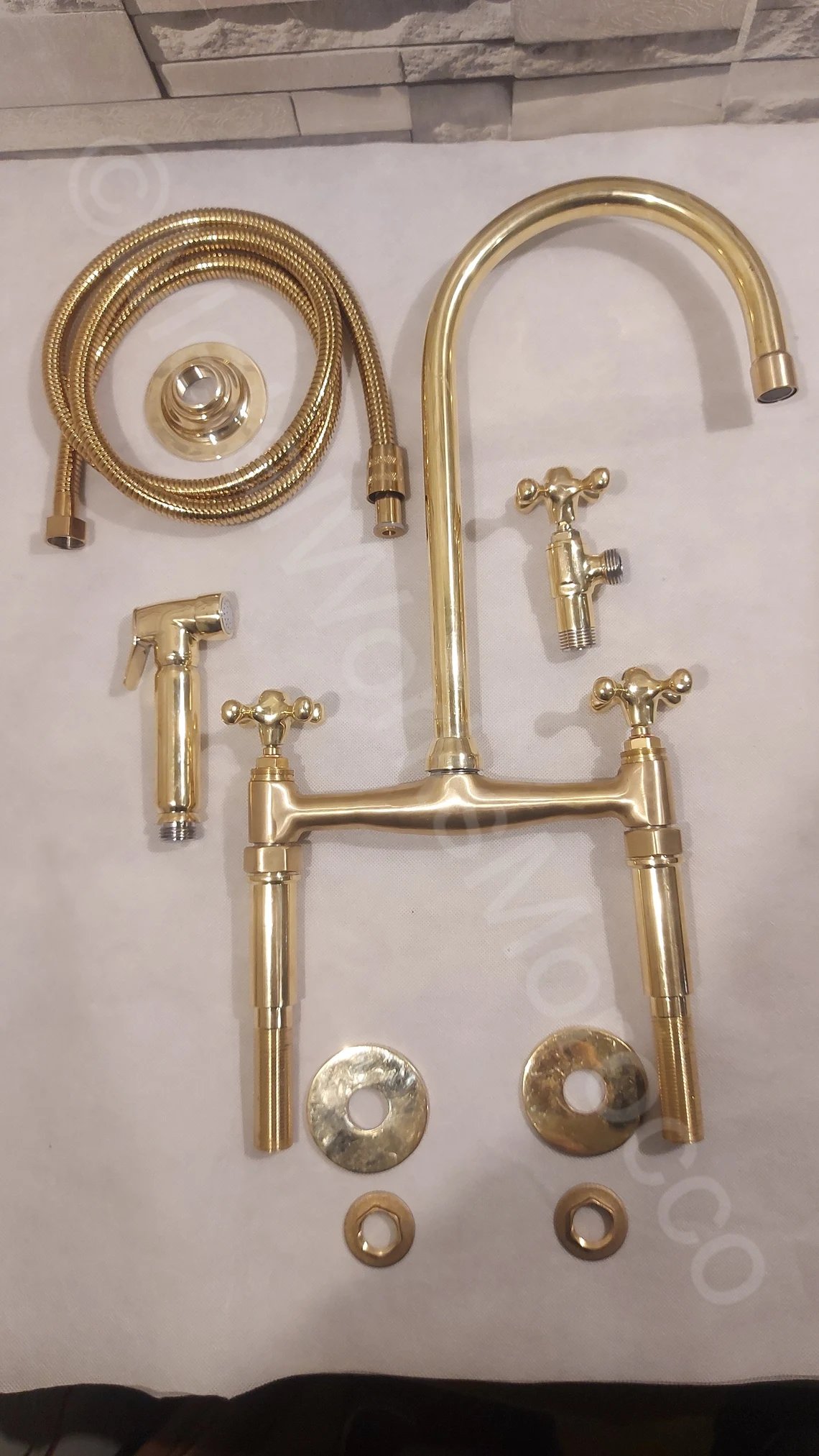 Aged brass kitchen faucet set with sprayer, hose and fittings