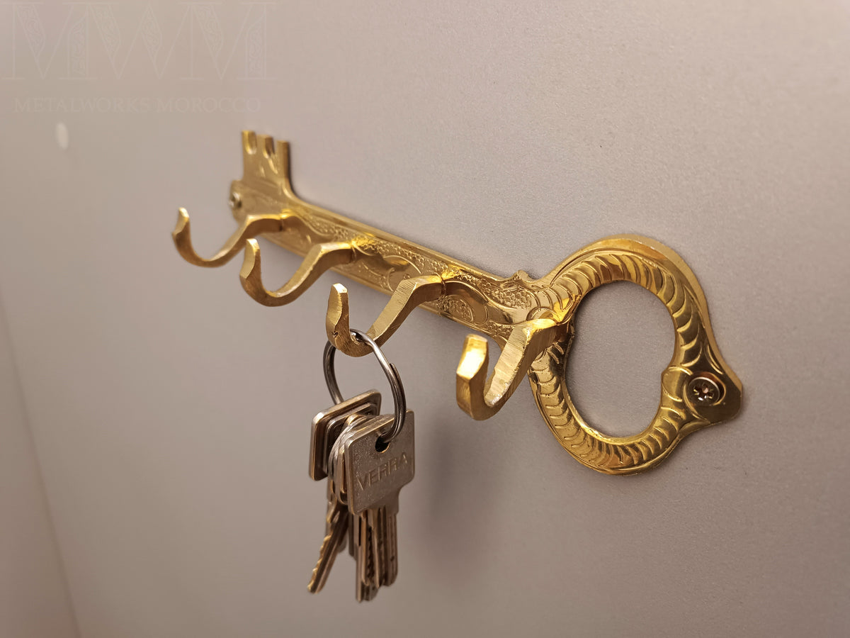 Natural Brass Key Holder For Wall installed in home setting