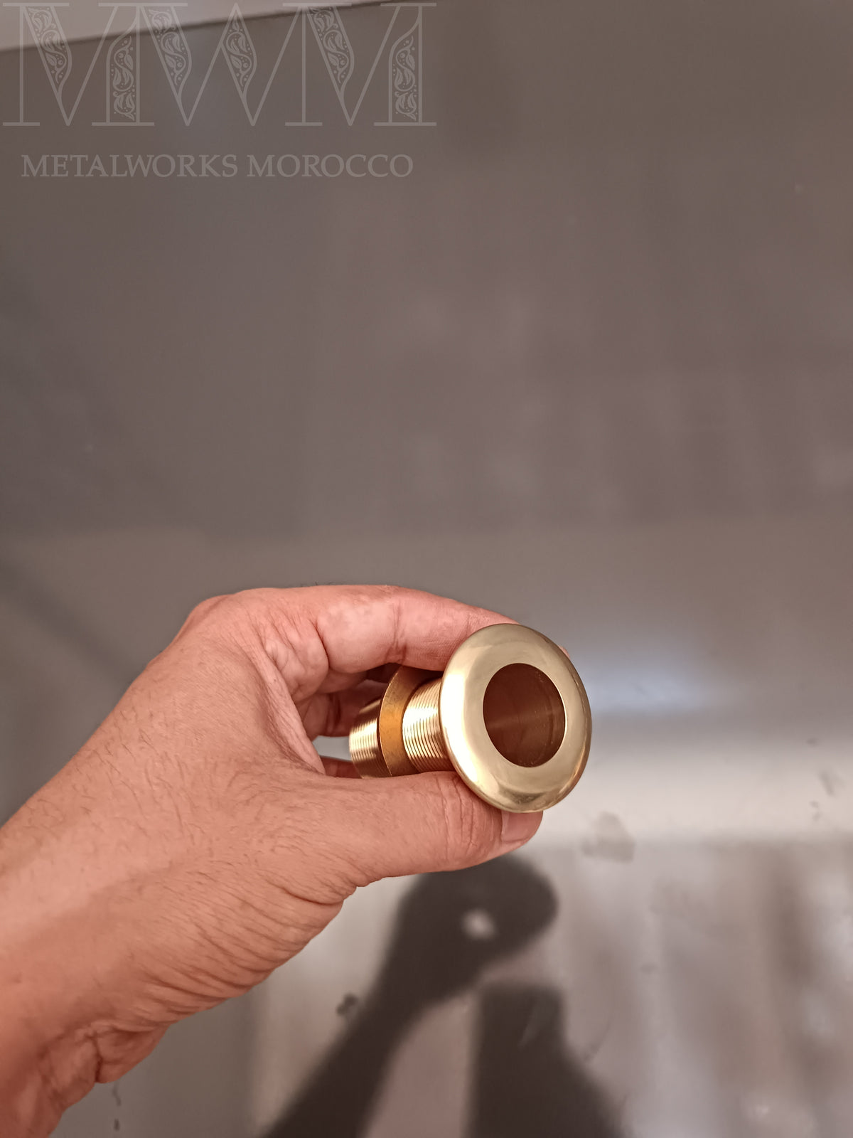 Unlacquered Brass Sink Side Sprayer installed in home setting