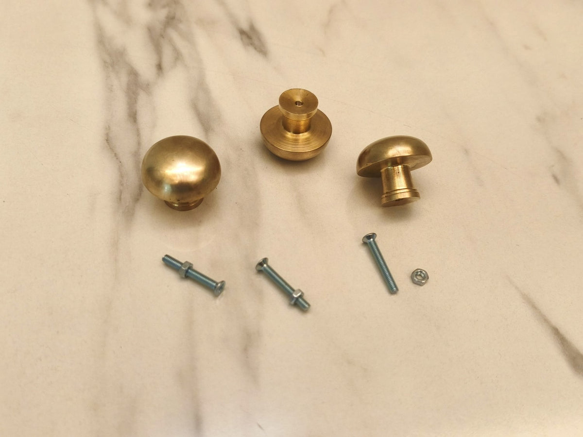 Burnished brass cabinet knobs with mounting screws included
