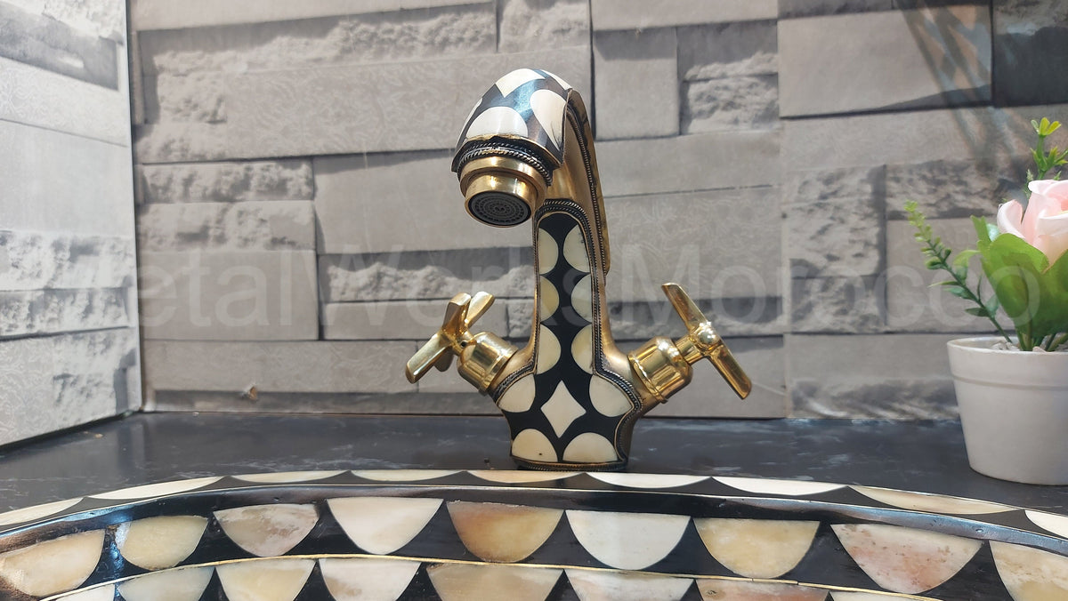 Brass Traditional Sink Faucet Studded With White And Black Resin installed in home setting